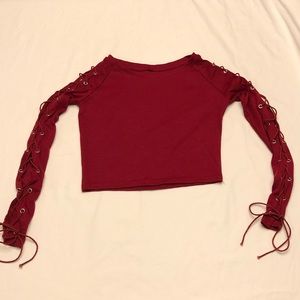 Red long laced sleeved crop top.